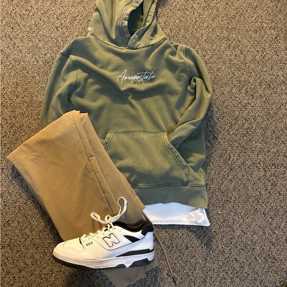 Aeropostale Green Hoodie with Tan Pants and New Balance Sneakers